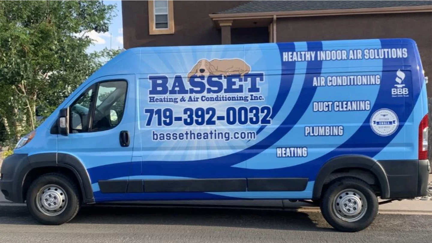 Basset logo truck outside of residential home in Colorado Springs, CO.